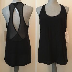 lululemon athletica Tops - LULULEMON Size 10 Black Tranquil Tank NWT lululemon athletica Tops - LULULEMON Size 10 Black Tranquil Tank NWT